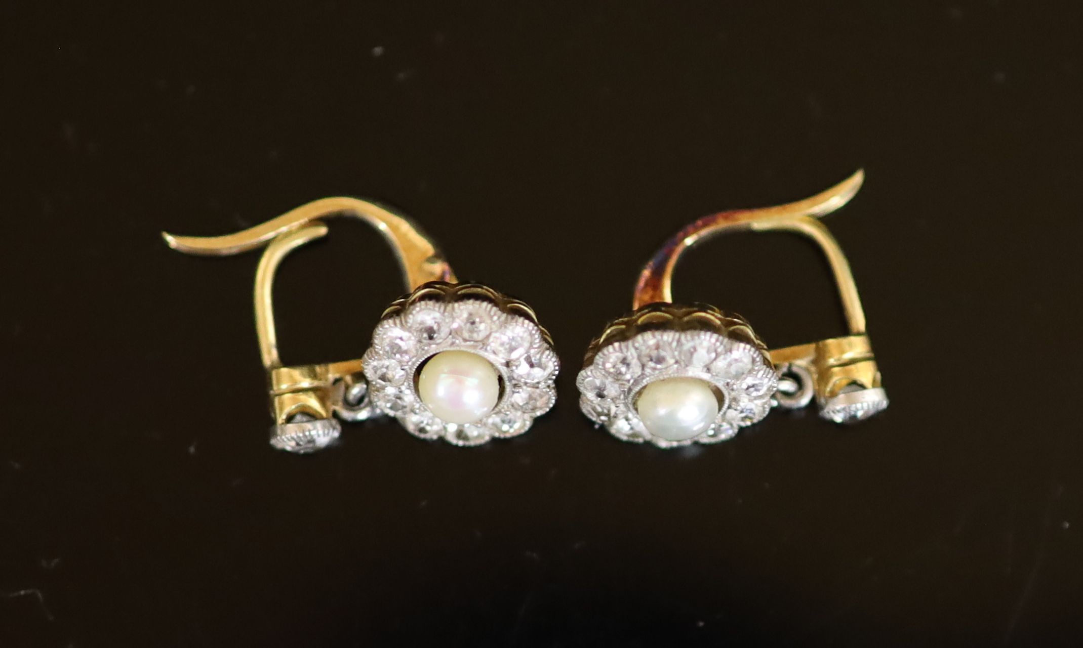 A pair of antique gold, pearl and diamond set circular cluster drop earrings